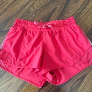 Red lululemon hotty hot shorts, size 2